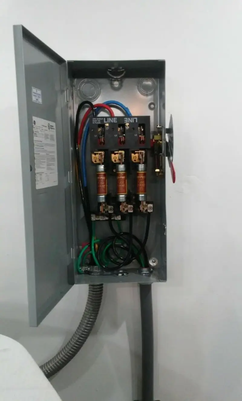 Three-phase disconnect switch installed for Smoke Detector Installation in Sunny Isles Beach